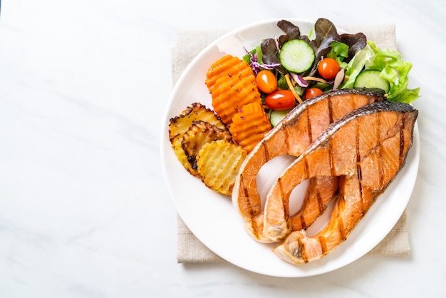 grilled salmon steak fillet with vegetable