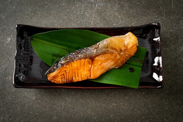 Grilled Salmon Steak with Soy Sauce on plate Japanese food style