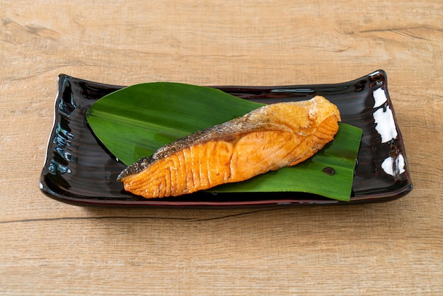 Grilled Salmon Steak with Soy Sauce on plate Japanese food style