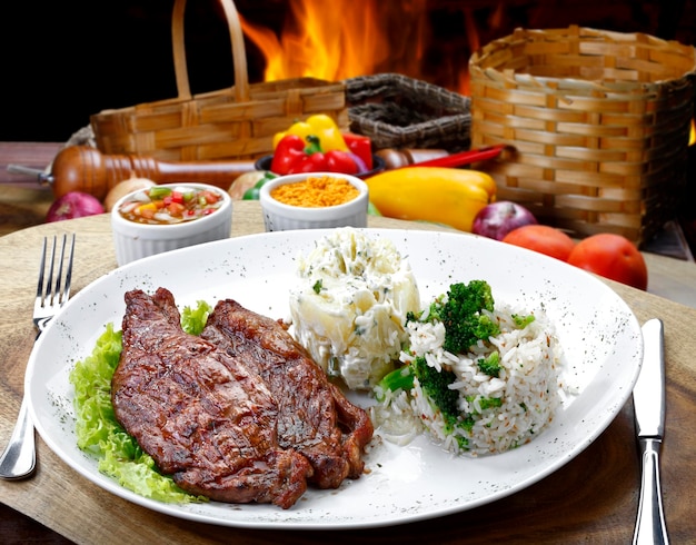 Grilled Steak with Salad and Mashed Potatoes