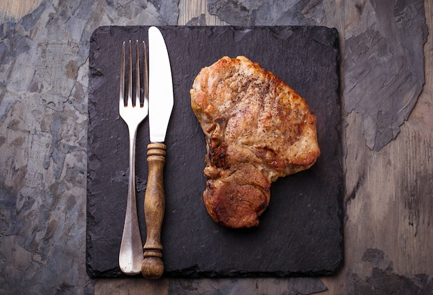 Grilled T-bone steak. Selective focus