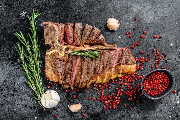 Grilled T bone steak on table