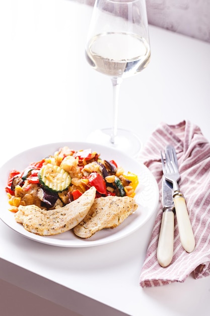 Grilled vegetables and fried chicken breast