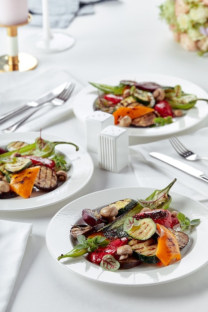 Grilled vegetables on a white plates. restaurant dish