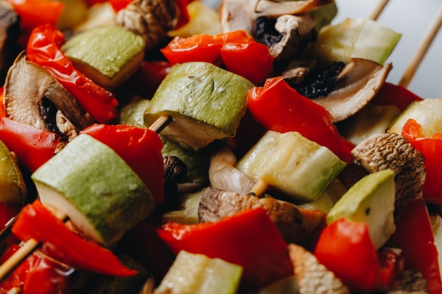 Grilled vegetables on wooden skewers. Catering. close up