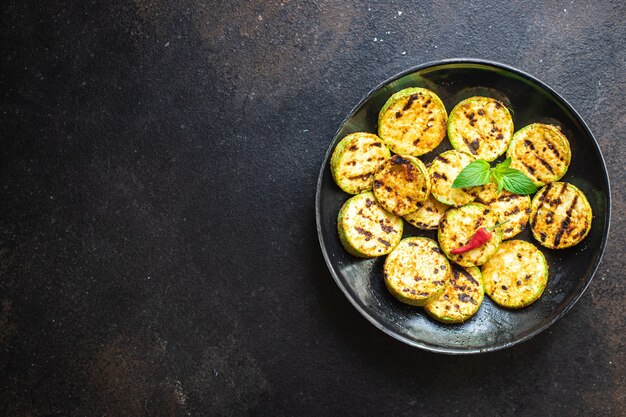 Grilled zucchini fried vegetables on the table healthy food meal snack copy space food background