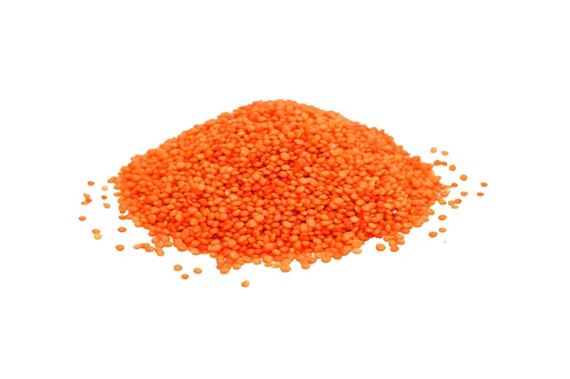 Groats red lentils isolated on white background