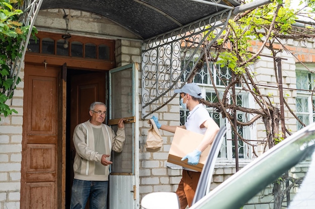 Grocery Food Shopping Help For Elder Senior Standing At Door.