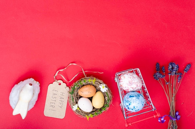 Grocery supermarket cart filled with chicken eggs. Concept of preparing for Easter, buying food. Space for text. Studio Photo