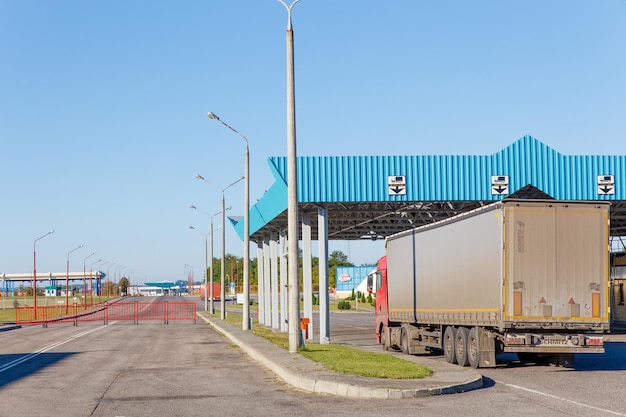 Grodno, Belarus - September 06, 2013: Lorry trucks cars in traffic jam at border zone custom in checkpoint Bruzgi.