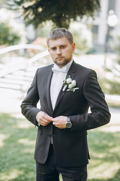 Groom in black tuxedo