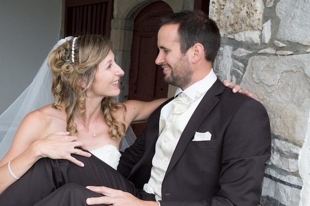 Groom and bride outside happy and in love