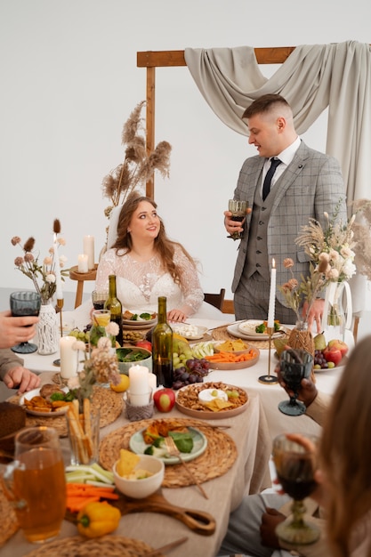 Groom giving toast to guests at his wedding