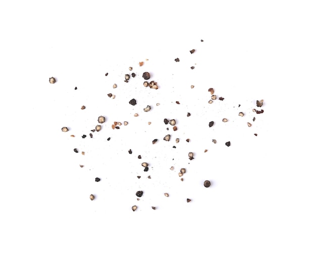 Ground black pepper isolated on a white background top view