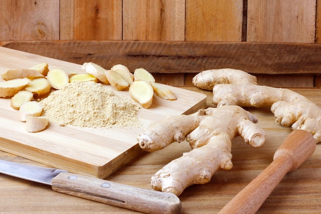 Ground ginger powder on rustic wooden table Antiinflammatory and antioxidant