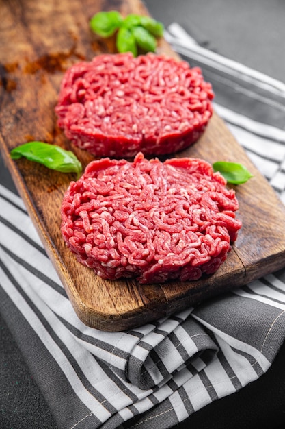 Photo ground meat raw cutlet fresh beef meat hamburger eating cooking appetizer meal food snack