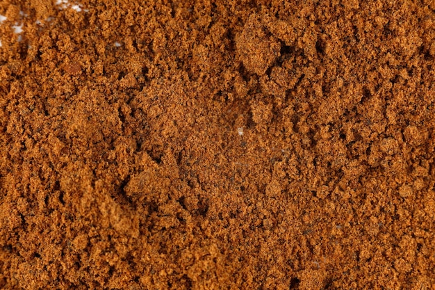 Ground nutmeg seasoning a lot closeup