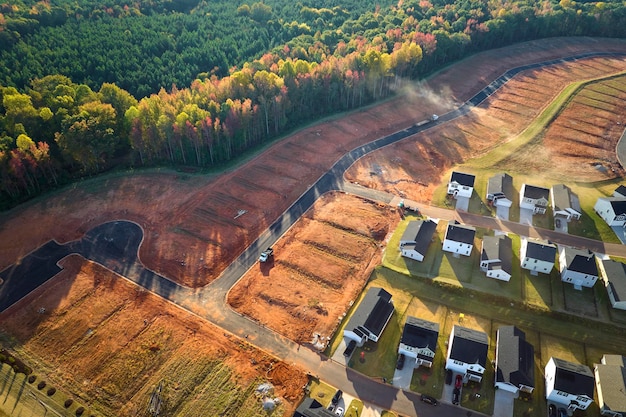 Ground prepared for building of new residential houses in South Carolina suburban development area Concept of growing american suburbs