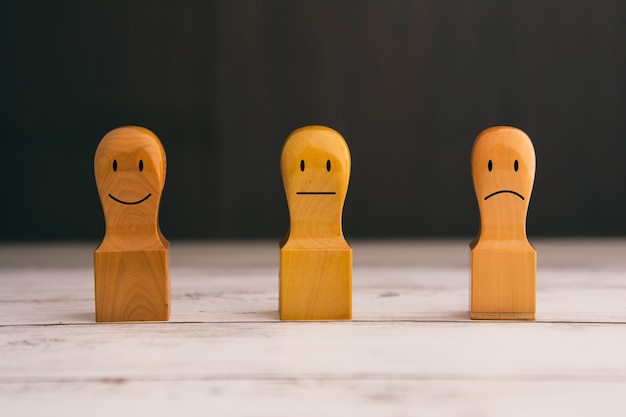 Group of 3 Wooden Models Expressing Facial Expressions