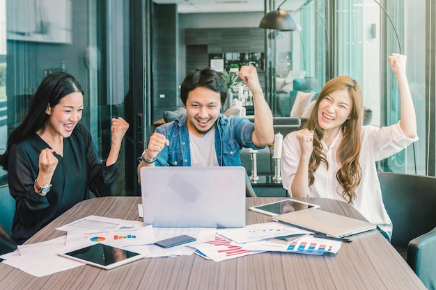 Group Of AsianBusiness people with casual suit working with happy action