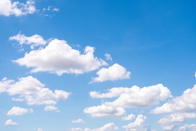 Group of beautiful sky white clouds perfect for the background clear blue sky sunlight winter