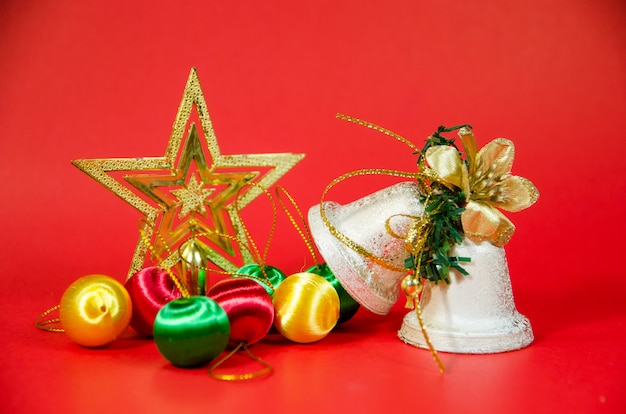 Group of bell, ball and gift in christmas on red background