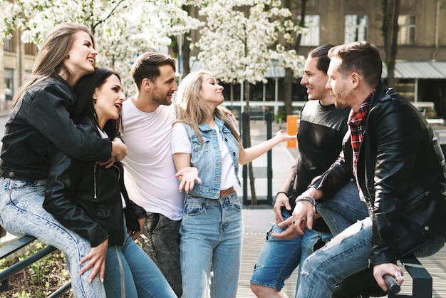 Group of best friends are having fun outdoors. Young people are