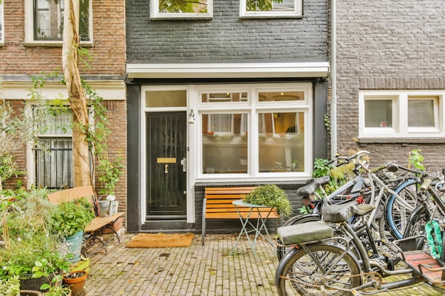 A group of bikes parked in front of a house