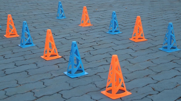 Photo a group of blue cones with a blue one that says  blue  on the bottom