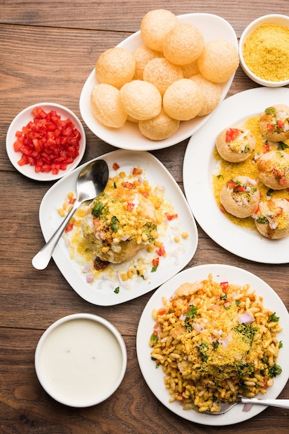 Group of Bombay chat food includes golgappa or panipuri, bhel-puri, sev-poori, dahipuri, Ragda pattice, raj kachori etc. selective focus