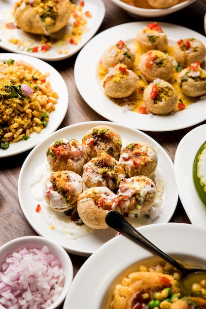 Group of Bombay chat food includes golgappa or panipuri, bhel-puri, sev-poori, dahipuri, Ragda pattice, raj kachori etc. selective focus