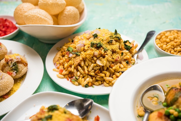 Group of Bombay chat food includes golgappa or panipuri, bhel-puri, sev-poori, dahipuri, Ragda pattice, raj kachori etc. selective focus