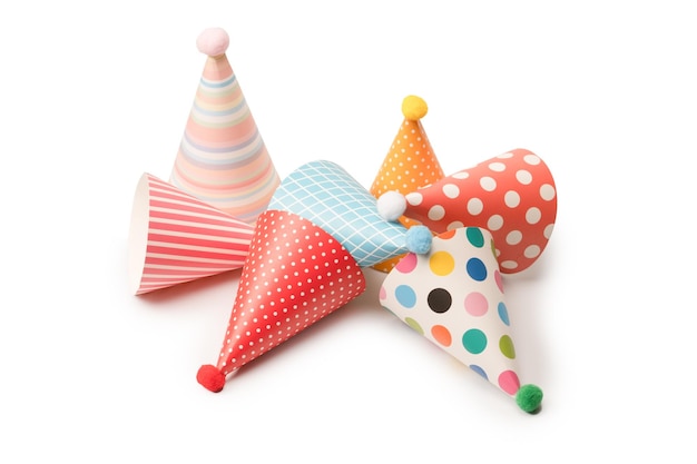 A group of bright and colorful birthday caps isolated on a white background