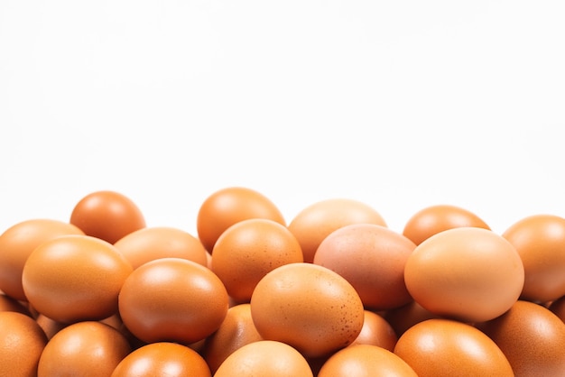 Group of brown eggs isolated on white Copy space