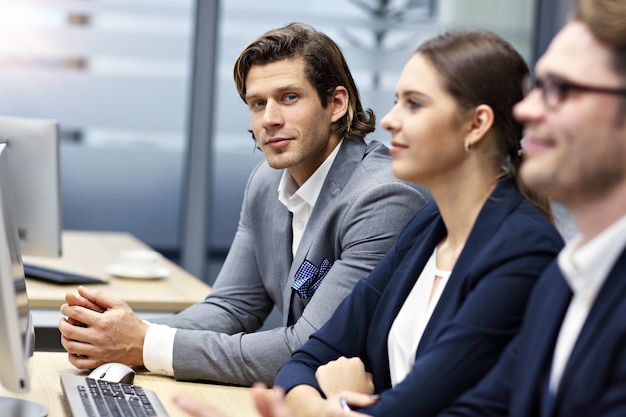 group of business people attending a conference