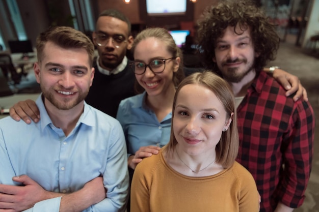 Group of business people during break from the work taking selfie picture while enjoying free time i