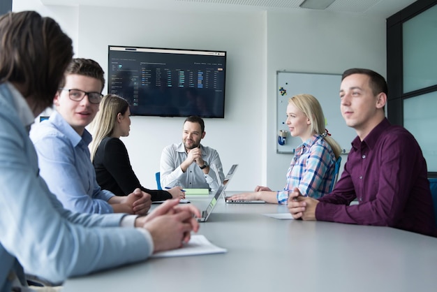 Group of business people discussing business plan  in the office