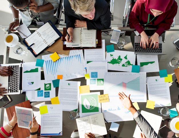 A Group of Business People in a Meeting about Environment 