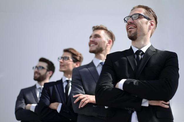 Group of business people standing in a row and looking at a copy spacebusiness concept