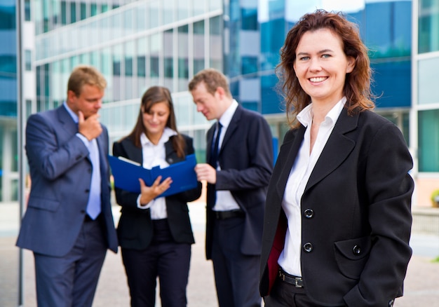 Group of business people with businesswoman leader 