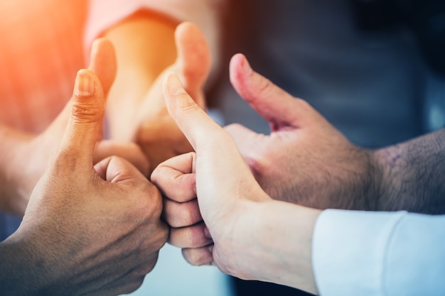 group of business teamwork hand togetrher with thumbs up 