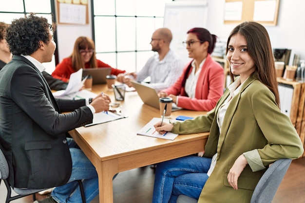 Group of business workers smiling happy working at the office