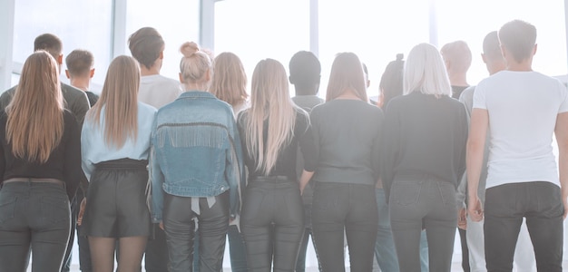 Group of casual young people looking forward