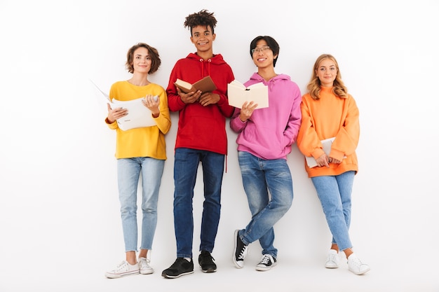 Group of cheerful teenagers isolated