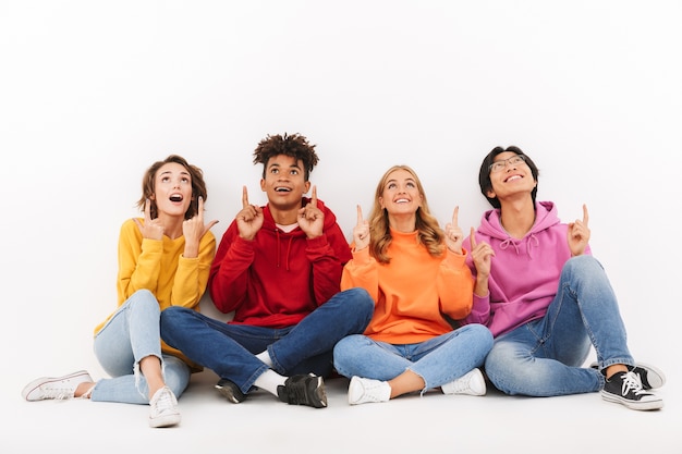 Group of cheerful teenagers isolated