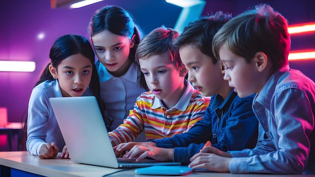 a group of children are looking at a laptop computer