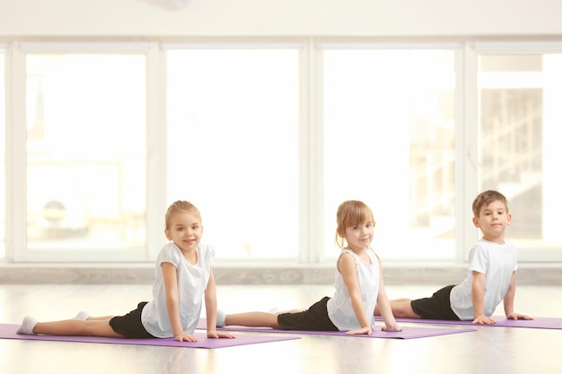 Group of children doing gymnastic exercises