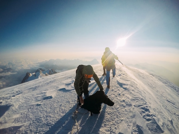 A group of climber friends on top of Mont Blanc