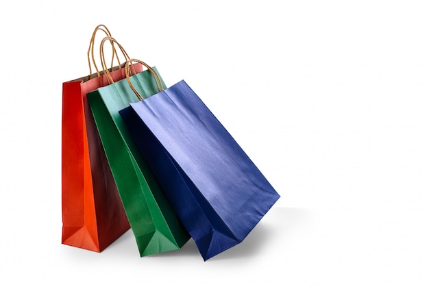 Group of colorful paper shopping bags isolated 