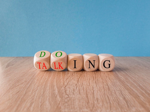 A group of dice with the word do talking on themTime to start doing